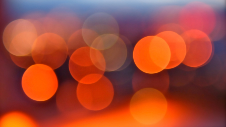 The Edge of Night by Rona Black, Salt Lake City lights at sunset in the form of bokeh in shades of orange and blue.